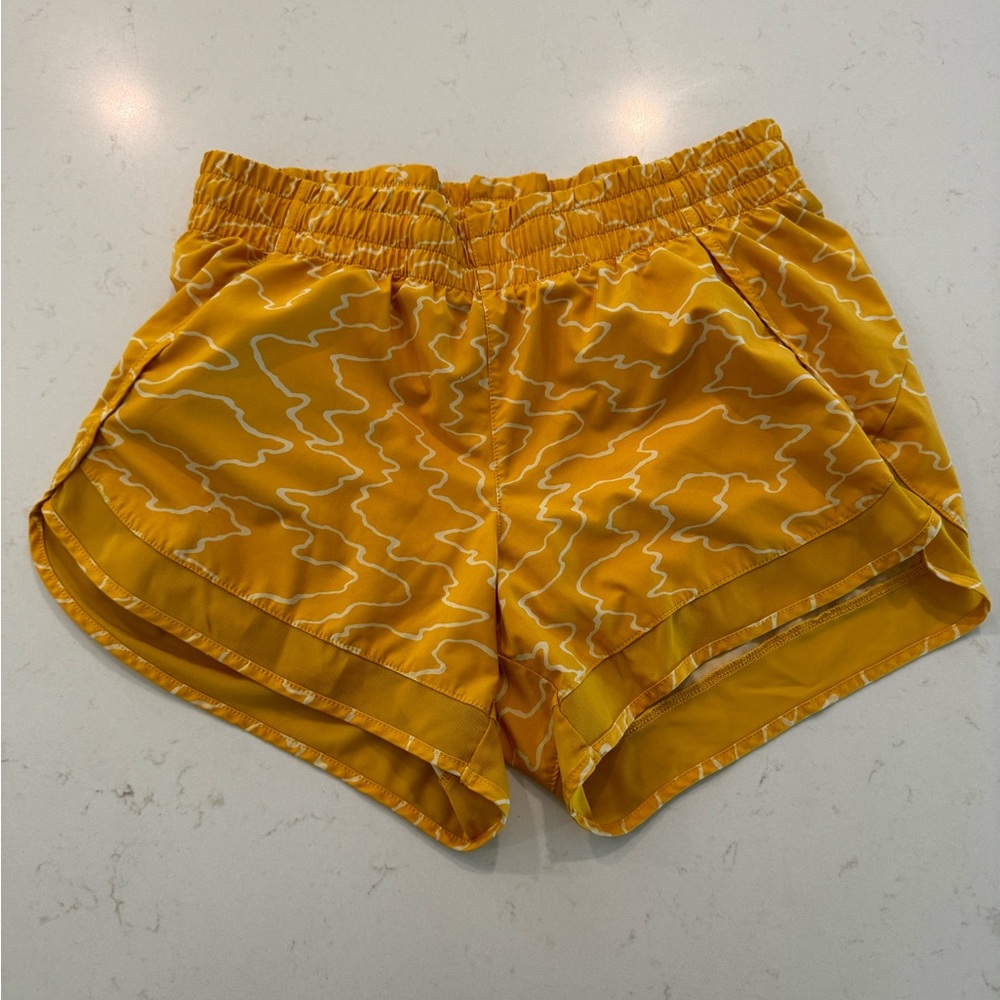ATHLETA Shorts Mesh Racer Run Mid Rise 4" Size Small Yellow